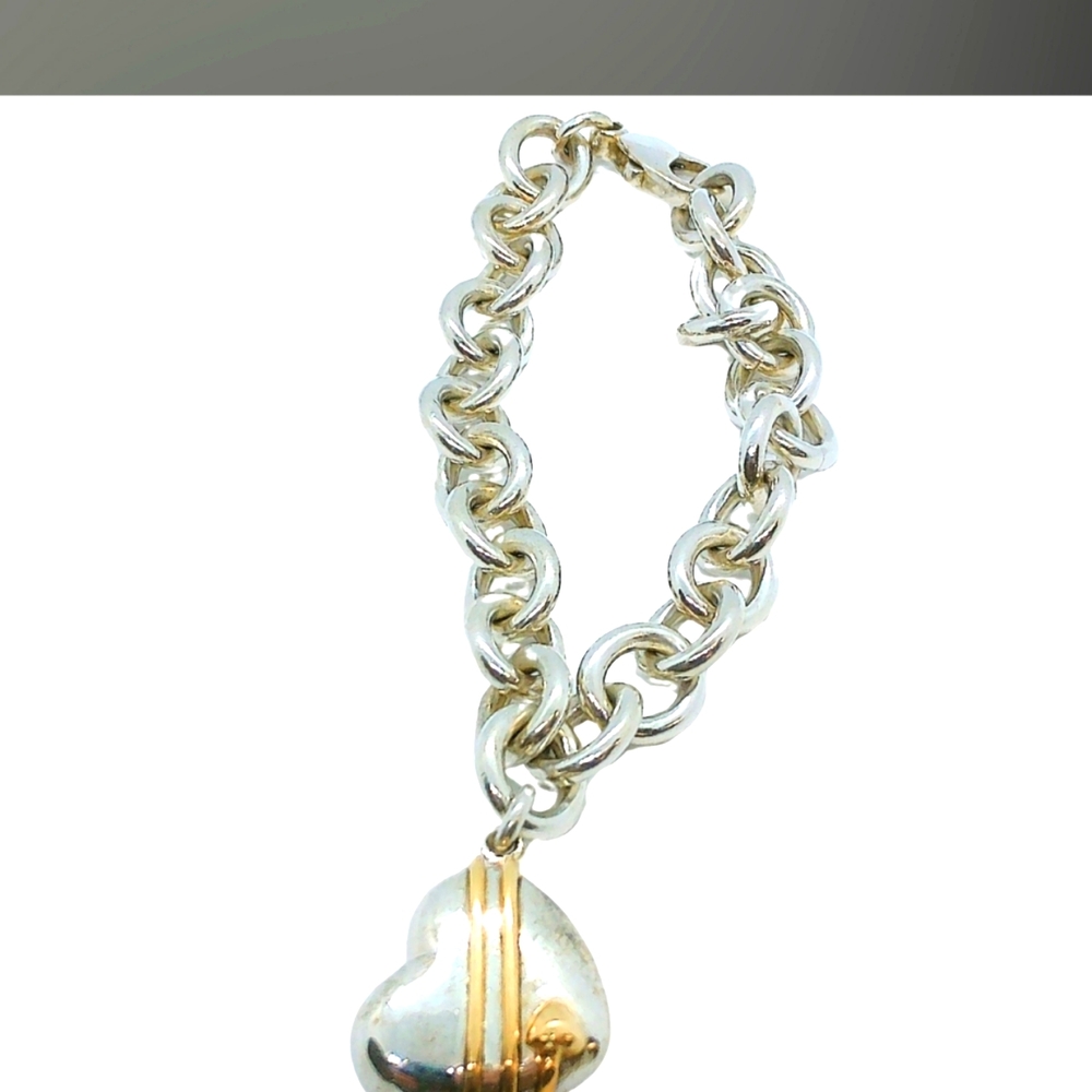 AUTHENTIC ,Tiffany Silver and Gold Heart Charm Bracelet. Beutiful Condition